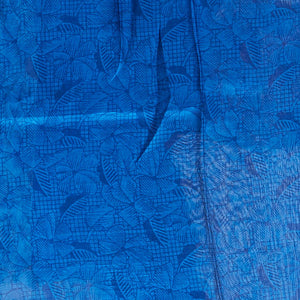 Blue floral vine design printed silk saree with contrast striped zari border