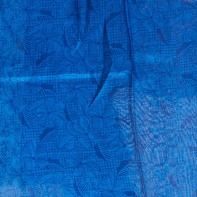 Blue floral vine design printed silk saree with contrast striped zari border
