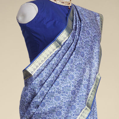 Blue floral vine design printed silk saree with contrast striped zari border