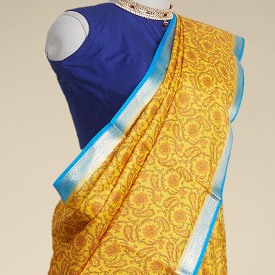 Yellow floral vine design printed silk saree with contrast striped zari border