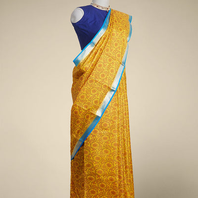 Yellow floral vine design printed silk saree with contrast striped zari border