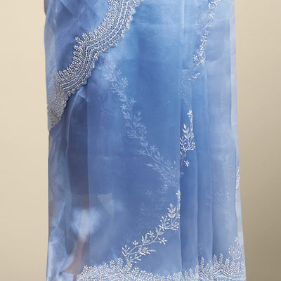 Blue floral emboridery tissue silk saree with scallop floral border