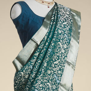 Green floral embroidery pure crepe saree with self intricate zari design border