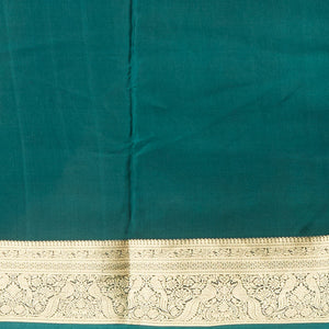 Green peacock motifs mysore silk saree with self intricate zari design border