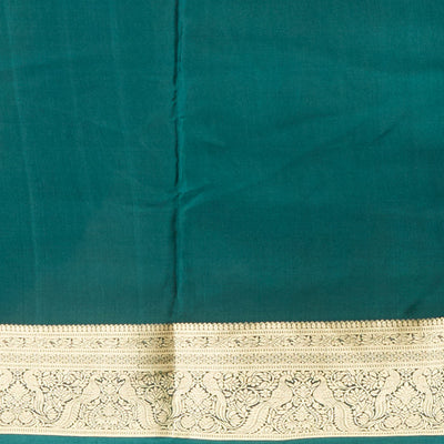 Green peacock motifs mysore silk saree with self intricate zari design border