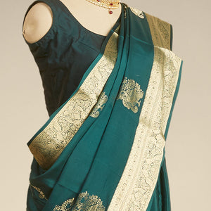 Green peacock motifs mysore silk saree with self intricate zari design border