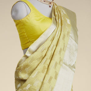 Yellow anial motifs pure crepe saree with self zari border