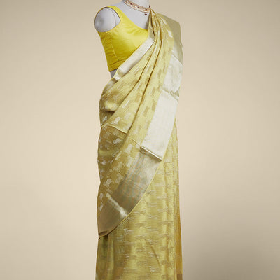 Yellow anial motifs pure crepe saree with self zari border