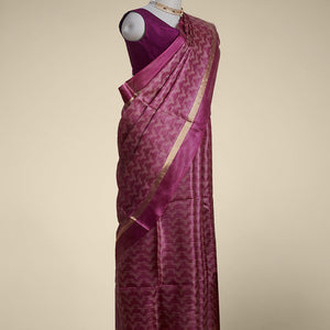 Purple animal motifs tussar silk saree with self zari border