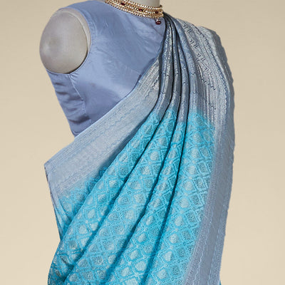 Blue argyle pattern pure crepe saree with intricate zari border