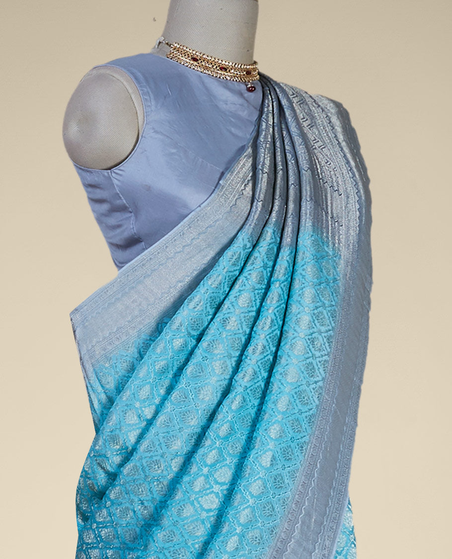 Blue argyle pattern pure crepe saree with intricate zari border