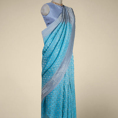 Blue argyle pattern pure crepe saree with intricate zari border