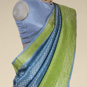 Blue argyle pattern pure crepe saree with intricate floral zari border