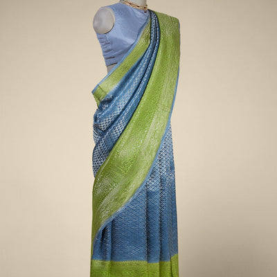 Blue argyle pattern pure crepe saree with intricate floral zari border