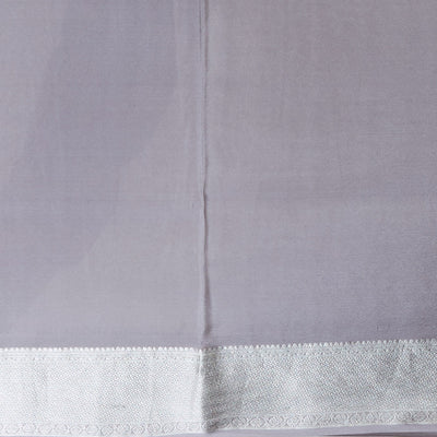 Grey floral design pure crepe saree with self zari border