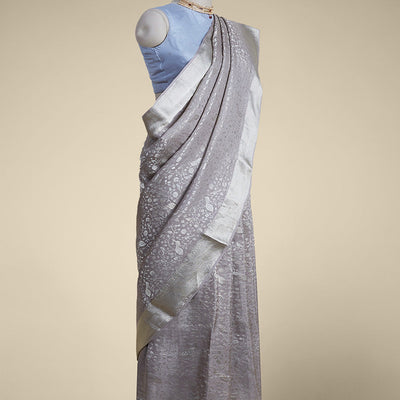 Grey floral design pure crepe saree with self zari border