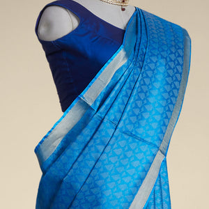 Blue leaf design tusser silk saree with self zari border