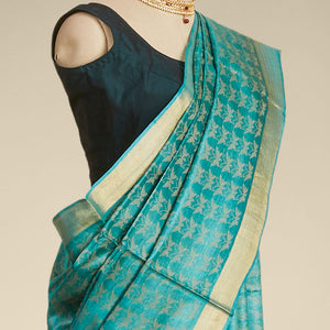 Green  intricate design  tusser silk saree with self zari border