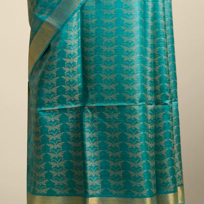 Green  intricate design  tusser silk saree with self zari border