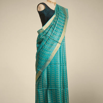 Green  intricate design  tusser silk saree with self zari border
