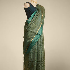 Green zig- zag striped design tusser silk saree with contrast zari border