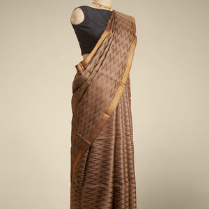 Brown zig- zag striped design tusser silk saree with contrast zari border