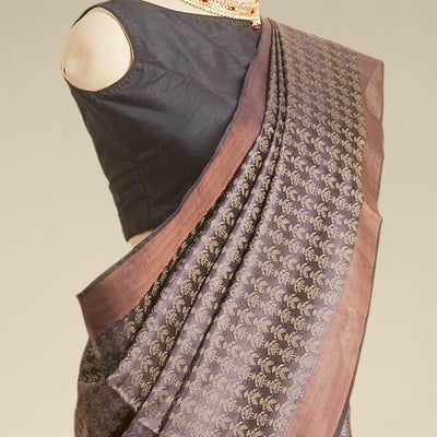 Brown floral design tusser silk saree with self zari border