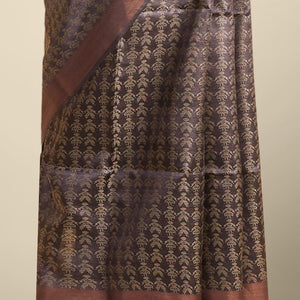 Brown floral design tusser silk saree with self zari border