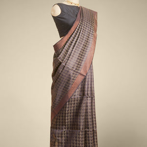 Brown floral design tusser silk saree with self zari border
