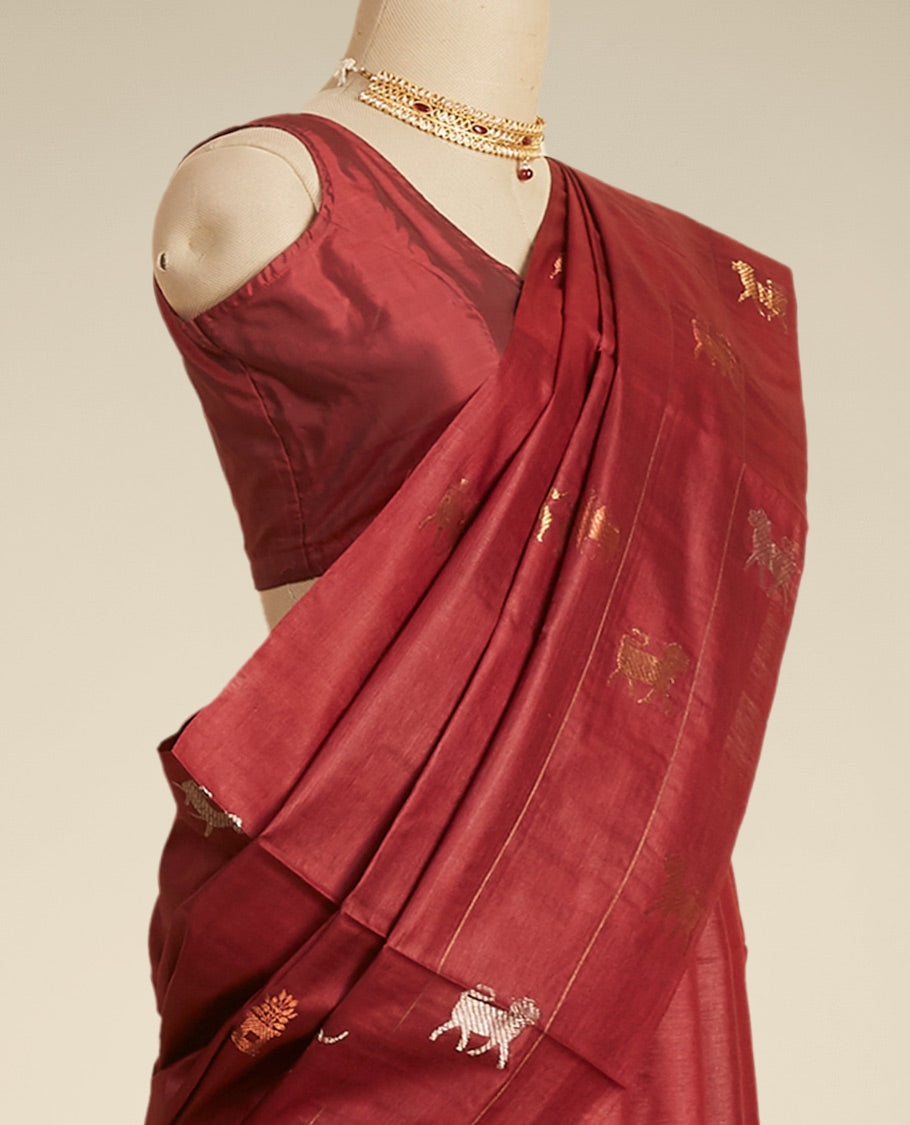 Borderless maroon all over animal motifs tusser silk saree