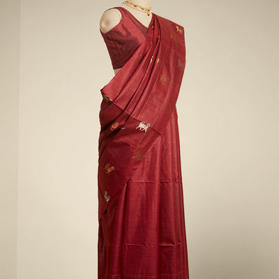 Borderless maroon all over animal motifs tusser silk saree
