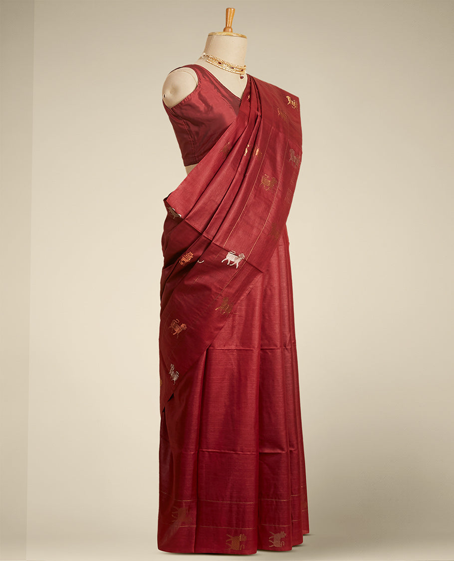 Borderless maroon all over animal motifs tusser silk saree