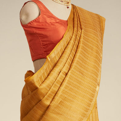 Yellow leaf vine design tusser silk saree with self zari border