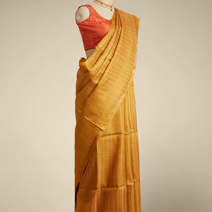 Yellow leaf vine design tusser silk saree with self zari border