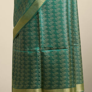 Green floral design tusser silk saree with self zari border