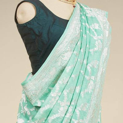 Green leaf motifs banaras georgette saree with traditional zari border