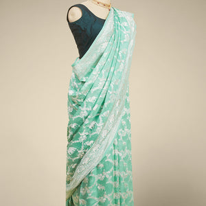 Green leaf motifs banaras georgette saree with traditional zari border