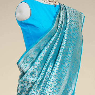 Blue ogee design banaras silk saree with self floral zari border