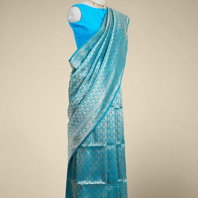 Blue ogee design banaras silk saree with self floral zari border
