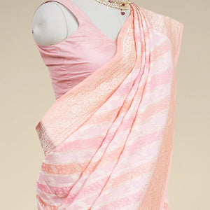 Peach rangkat style banaras georgette saree with contrast floral zari border