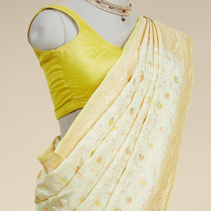 Yellow floral vine design  banaras georgette saree with contrast inticate zari border