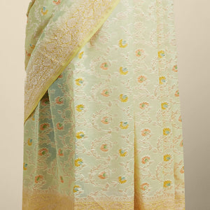 Yellow floral vine design  banaras georgette saree with contrast inticate zari border