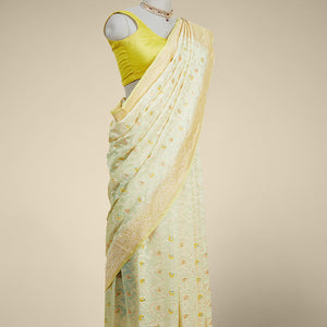Yellow floral vine design  banaras georgette saree with contrast inticate zari border