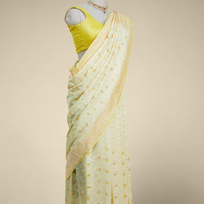 Yellow floral vine design  banaras georgette saree with contrast inticate zari border