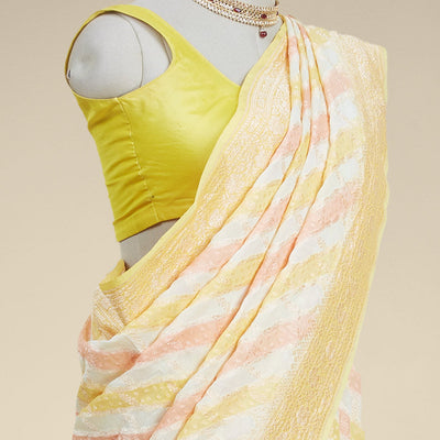 Yellow rangkat style banaras georgette saree with contrast floral zari border