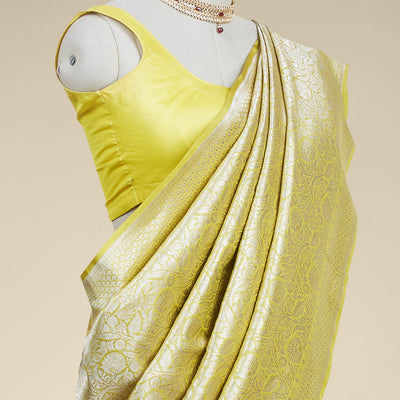 Yellow floral jacquard banaras silk saree with self intricate zari border