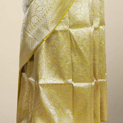 Yellow floral jacquard banaras silk saree with self intricate zari border