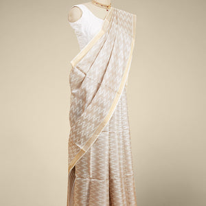 Cream zig zag striped design tusser silk saree with self zari border