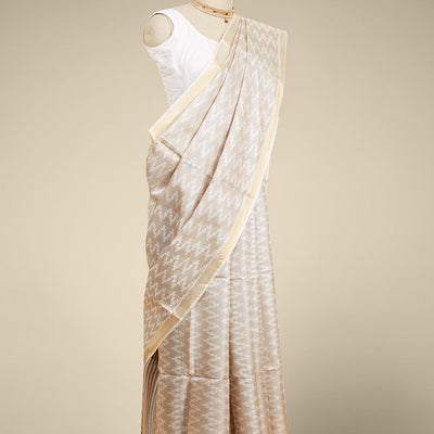 Cream zig zag striped design tusser silk saree with self zari border