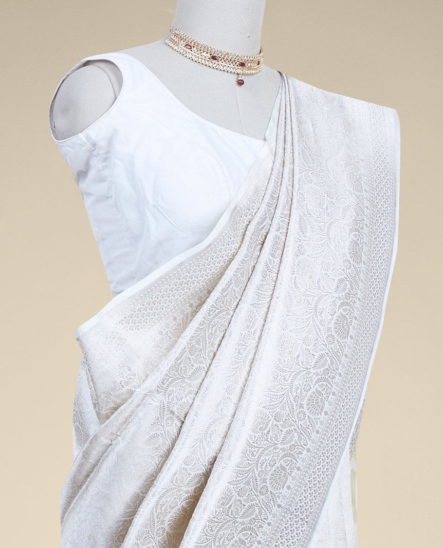 Cream floral jacquard banaras silk saree with self intricate zari border